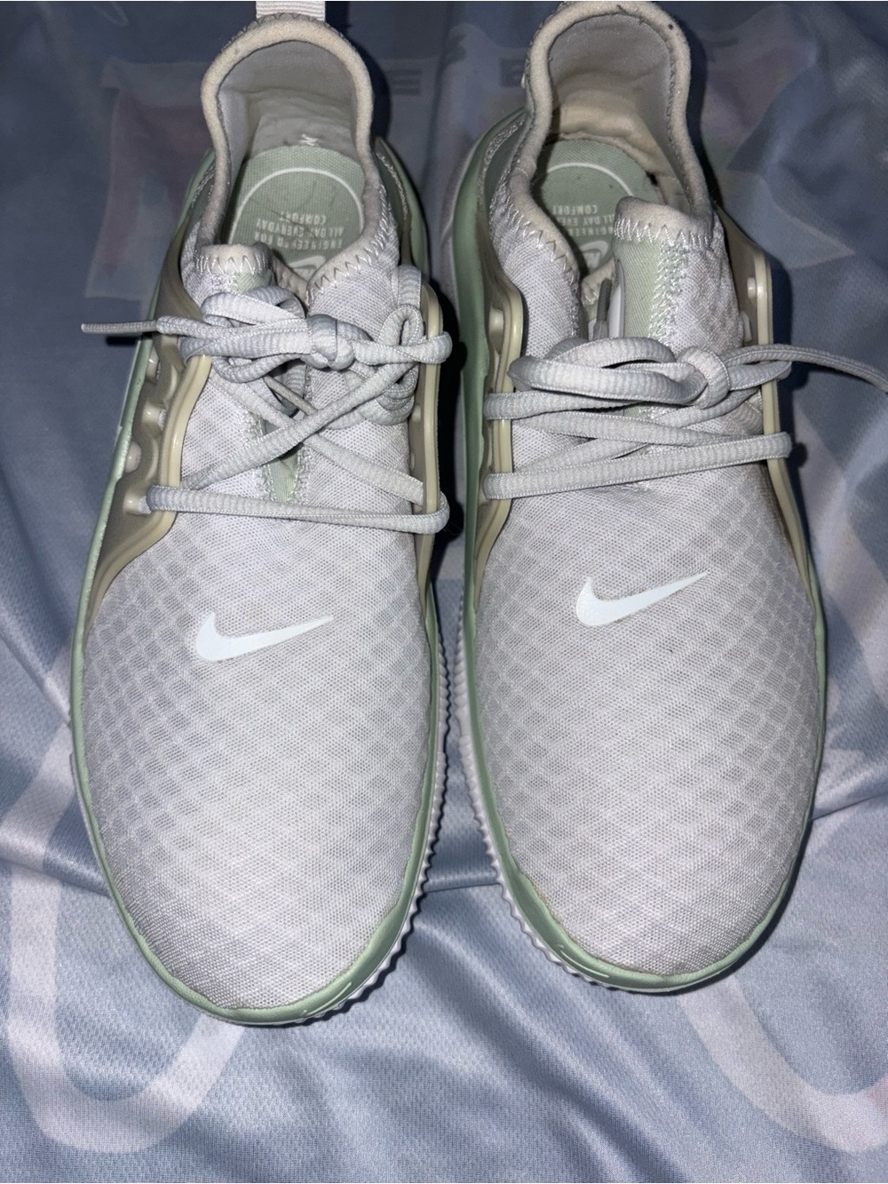 Nike women’s Gray and Mint Mesh Sneakers
